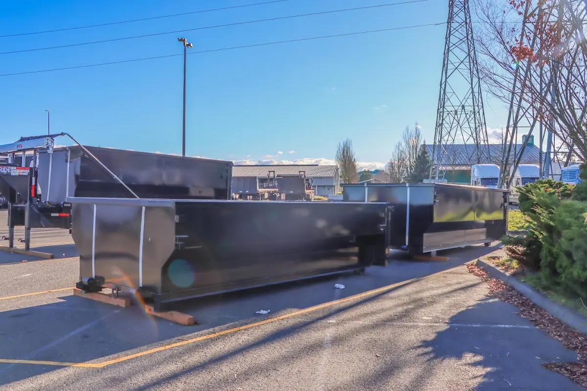 Roll-off dumpster ready for waste disposal at job site for 2 Yard Dumpster Rental in Dundalk